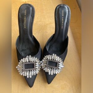 Black heeled mules with Gem